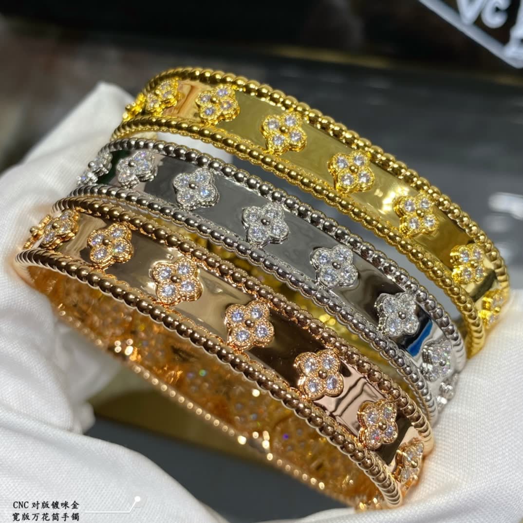 Van Cleef & Arpels Gold and Silver Flower Pattern Bracelets